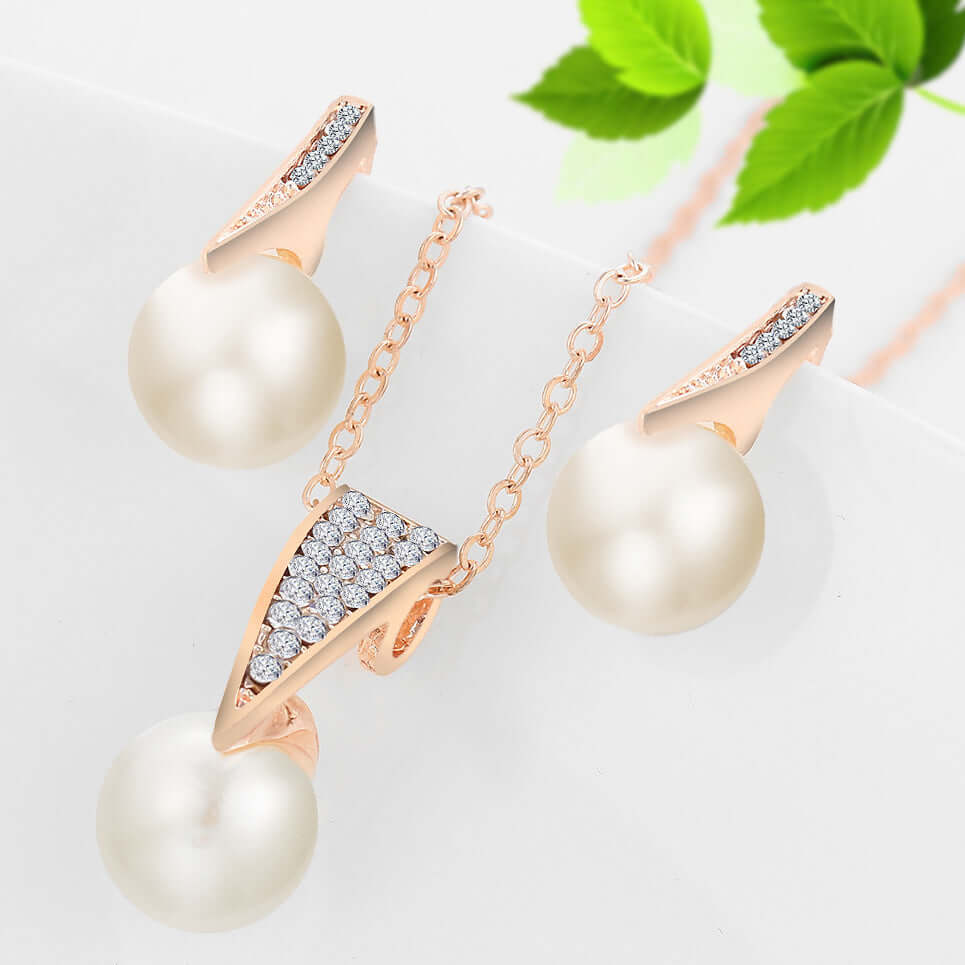 bridal pearl necklace and earrings set featuring elegant pearl and diamond accents.