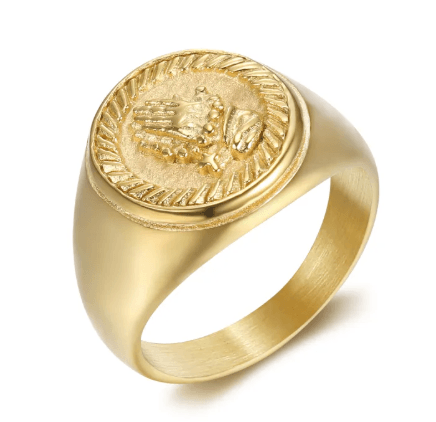 Nordic titanium steel ring with a gold finish and embossed design, highlighting minimalist aesthetics.