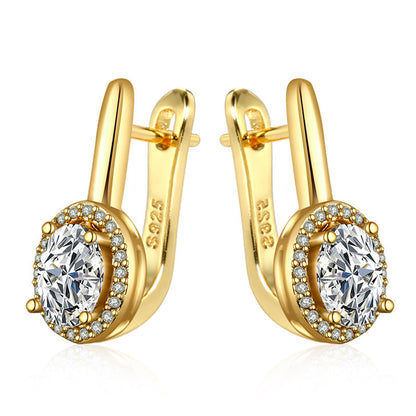 Zirconia circle stud earrings in elegant gold, featuring sparkling round zirconia, perfect for versatile styling.