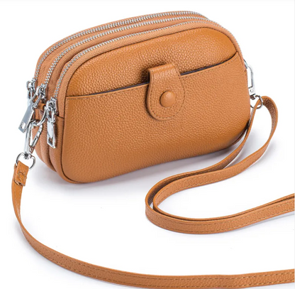 New Leather Fashion Mobile Phone Bag in a stylish brown color with zippers and a crossbody strap.