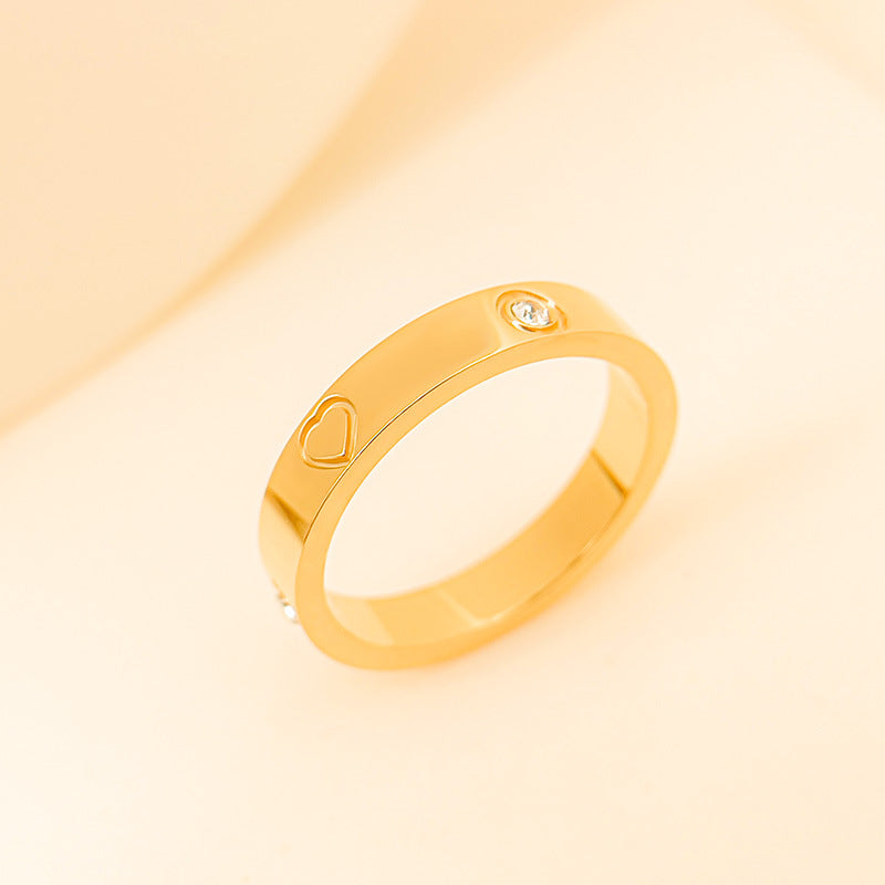 Gold rhinestone titanium steel bracelet ring featuring a heart design and sparkling stone detail.