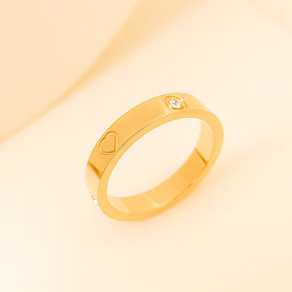 Gold rhinestone titanium steel bracelet ring featuring a heart design and sparkling stone detail.